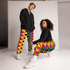 The unisex track pants are your new go-to piece for working out or styling a streetwear outfit. The water-resistant, lightweight fabric and mesh lining provide comfort, while elastic ankle cuffs will make it easy for you to show off your kicks. Style it with a windbreaker for a complete look and feel. * 100% polyester * Fabric weight: 2.21 oz/yd² (75 g/m²) * Lightweight, water-resistant fabric * Fully lined, mesh lining  * Relaxed fit * Elastic waistband and ankle cuffs * Drawcord * Zip pockets * Sits at hip * Blank product sourced from China This product is made especially for you as soon as you place an order, which is why it takes us a bit longer to deliver it to you. Making products on demand instead of in bulk helps reduce overproduction, so thank you for making thoughtful purchasing Ankle Cuffs, Water Resistant Fabric, Streetwear Outfit, Lightweight Fabric, Track Pants, Labour Day, Fabric Weights, Zip Pockets, Gender Neutral