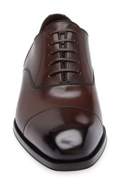 Styled with a cap toe and signature Blake welting, this burnished-leather oxford adds sophisticated flair to your formal looks. Lace-up style Leather upper, lining and sole Made in Italy Designer Shoes Semi-formal Bridle Leather Oxfords With Almond Toe, Formal Oxford Cap Toe Derby Shoes, Formal Cap Toe Oxford Derby Shoes, Cap Toe Derby Shoes For Formal Occasions, Timeless Cap Toe Derby Shoes For Semi-formal Occasions, Timeless Semi-formal Cap Toe Derby, Classic Cap Toe Derby For Formal Occasions, Formal Classic Cap Toe Derby, Timeless Formal Oxfords With Goodyear Welt