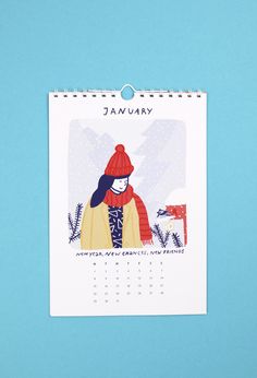 a calendar with an image of a woman wearing a red hat and scarf on it