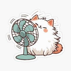 a white cat sitting on top of a table next to a small fan sticker