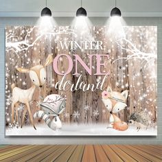 a christmas scene with deer and snowflakes in front of a wooden background that says winter one island