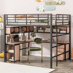 a loft bed with desk underneath it in a room that has hardwood floors and white walls