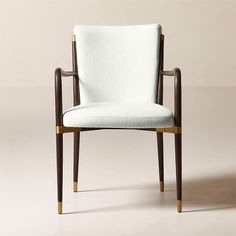 a white chair with wooden legs and arms