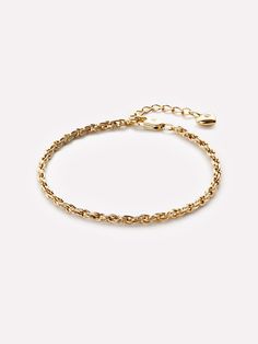 Your wrist is missing this gold twisted chain bracelet with a heart extender co-designed with Lisa Rhee, dancer and YouTube superstar. Carefully handcrafted and dipped in 14k gold, this chain bracelet is feminine and loveable. With adjustable size due to its gorgeous extender, this gold bracelet is as practical as it is stylish. • Braided chain bracelet with adjustable size• Sleek heart extender with a cubic zirconia gem • Versatile, lightweight & polished texture Twisted Chain, Solid Gold Earrings, Co Design, Gold Plated Bracelets, Christmas 2024, Gifts For New Moms, Gold Material, A Heart, Layered Necklaces