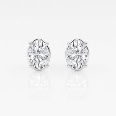 There's nothing more versatile than a pair of classic stud earrings. We love these princess cut lab grown diamond studs for every occasion. Pick the size and color best suited to your ears in the color of gold that you fancy. Solitaire Studs, 2 Carat, Oval Diamond, Diamond Solitaire, Diamond Studs, Princess Cut, Oval Cut, Diamond Shapes, Rhodium Plated