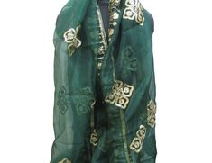 Pattern - an embroidered scarf. Ideal for - women/ girls. Occasion - formal or casual. Ideal for functions or parties. Fabric - organza silk, has a fine texture with a nice fall. Color - green, on green background floral embroidery, is with golden gota thread. Size - 36 x 88 inches approx. Can be wrapped in different styles. Care - gentle hand wash. For more such scarves please visit- For more such scarves For all orders, $120 and above, it will be express delivery through DHL confirmed delivery Green Dupatta For Eid Celebration, Traditional Green Scarves For Festive Season, Festive Green Bohemian Scarves, Embroidered Green Shawl Dupatta, Green Embroidered Shawl Dupatta, Elegant Green Embroidered Shawl, Green Shawl With Resham Embroidery In Traditional Drape, Green Embroidered Silk Dupatta, Green Embroidered Dupatta Shawl