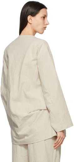 Long sleeve plain-woven cotton, linen, and ramie-blend jacket in beige. Y-neck collar. Offset self-tie fastening at front. Patch pockets at waist. Dropped shoulders. Unlined. Supplier color: Natural Lauren Manoogian, Cargo Jacket, Neck Collar, Luxury Streetwear, Cotton Weaving, Drop Shoulder, Cotton Linen, Patch Pocket, Designer Fashion