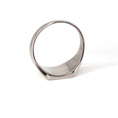 This ring is the perfect choice for men who are looking for a unique and stylish piece of jewelry. It is made of 925 silver and features a bold bar design that is sure to stand out. The silver color is perfect for making a statement and will match any outfit.    Handmade item  Material detail  Metal: Sterling Silver  Hypoallergenic and Lead, Cadmium, and Nickel Free.  Gift wrapping available  Jewelry Pieces Made in New York City USA. What is sterling silver?  Since its creation, sterling silver has been used in jewelry design by all cultures across the world. Sterling silver contains 92. 50% pure silver and is mixed with other alloys such as copper, zinc, or palladium to make it stronger and more durable overall. From a manufacturing perspective, this implies that sterling silver can be wo Modern Sterling Silver Formal Signet Ring, Modern Sterling Silver Signet Ring For Formal Occasions, Silver Polished Signet Ring For Everyday, Modern Sterling Silver Signet Ring With Polished Edges, Modernist White Gold Signet Ring In Sterling Silver, Modernist Rectangular Signet Ring With Polished Finish, Modernist White Gold Sterling Silver Signet Ring, Rectangular Modernist Signet Ring With Polished Finish, Modern Silver Signet Ring With Polished Edges