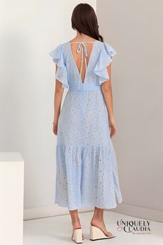 Flaunt your graceful style in the beautiful Mackenzie Eyelet Tiered Ruffle Sleeve Maxi Dress. The stunning light blue fabric with eyelet detail all over, makes this dress so romantic that lends you an ethereal look. Showcasing a diamond neckline and flutter short sleeves bringing subtle elegance and femininity to your look, this dress features a sash-tie at the waist for that perfect figure-hugging fit. What's more? The back of the dress has a deep v-cut with adjustable dainty tie detail that co