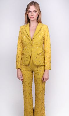 We salute you for being a strong, radiant human being, who kicks ass and gets shit done each and every day. That's why you deserve to be decorated in the highest regard and is exactly why AOI has brought you the Any Old Iron Colonel Mustard Suit. This bold mustard yellow suit features a fitted blazer and a pair of flare trousers, which have been completely embellished by hand with beads and sequins galore. Some of the detailing is applied to replicate foliage you may find through the harvest sea Mustard Yellow Suit, Mustard Suit, Colonel Mustard, Yellow Suit, Mustard Color, Human Being, Flare Trousers, Fitted Blazer, Cool Jackets