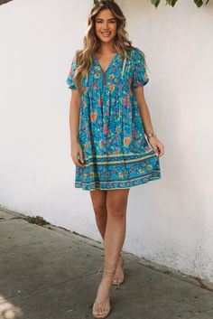 Blue Floral Print Empire Waist Flowy Dress Blue Bohemian Knee-length Dress, Casual Flowy Turquoise Dress, Casual Turquoise Floral Print Dress, Blue V-neck Boho Sundress, Turquoise V-neck Mini Dress, Casual Style, Casual Turquoise V-neck Mini Dress, Turquoise V-neck Mini Dress Casual, Casual Turquoise V-neck Dress, Blue Bohemian Mini Dress Knee-length