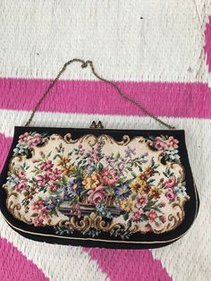 Beautiful vintage handbag with a floral embroidery tapestry motif handmade , no damage to the tapestry in such good condition ! The inside is lined with a lovely satin silk fabric in gold  , both side has an inner pocket , a small mirror and a little satin purse to put your money / coins . The interior of the clutch is in a perfect condition , the entire purse such a gorgeous piece .                                         Sizing :24 cm * 15 cm / 9,5 inches * 5,8 inches Vintage Rectangular Bags With Gold Embroidery, Vintage Formal Bag With Floral Embroidery, Vintage Floral Embroidered Bag For Formal Occasions, Vintage Floral Embroidery Bags For Formal Occasions, Vintage Floral Embroidery Formal Bags, Vintage Embroidered Rectangular Clutch, Vintage Embroidered Clutch Evening Bag, Vintage Gold Embroidered Clutch, Formal Embroidered Tapestry Bag