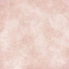 a light pink background with some stains on it