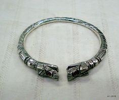 "ethnic tribal silver makara Heads Bracelet / Bangle (Kara) from Rajasthan India. Made of silver and then engraved design on it. nice design good for jewelry collection. Inner circumference without open part - 16.8 cm (6.6\") width max.- 0.8 cm weight - 54 grams material - silver." Silver Temple Jewelry Bracelets For Ceremonial Occasions, Ceremonial Silver Temple Jewelry Bracelet, Silver Temple Jewelry Bracelets For Festival, Silver Bohemian Bracelets For Puja, Silver Bohemian Bracelet For Puja, Silver Bracelet Cuff, Engraved Design, Rajasthan India, Bracelet Cuff