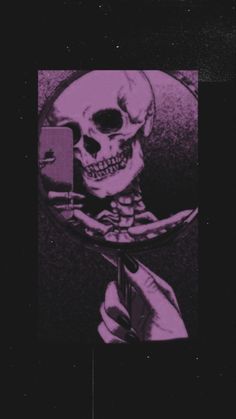 a skeleton holding a cell phone in front of it's face and looking into the mirror