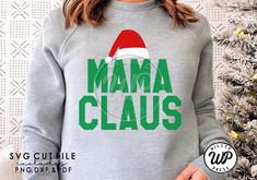 a woman wearing an ugly sweater with the word'auntee claus'printed on it