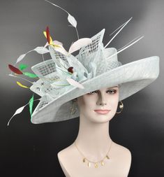 "Buying a hat? Don't forget to send me  your head measurement before placingyour order! IF YOU LIKE THE DESIGN, JUST WANT TO ADD SOME COLORS TO MATCH YOUR DRESS, PLEASE FEEL FREE TO CONTACT ME, I WILL HELP YOU. This beautiful sinamay hat is an elegant wear at any church or derby event. its sinamay material is not too intimidating and attracts the eye. The chic flower adnorment that rests on the wide, side sweep brim is complemented by sinamay accentuations. Material: Sinamay with feathers Crown Whimsical Curved Brim Hat For Royal Ascot, Whimsical Costume Hat With Curved Brim For Royal Ascot, Whimsical Hats For Royal Ascot Garden Party, Whimsical Curved Brim Hat For Kentucky Derby, Whimsical Hat With Short Brim For Kentucky Derby, Whimsical Hats With Curved Brim For Races, Flat Brim Costume Hats For Royal Ascot Garden Party, Whimsical Short Brim Hat For Kentucky Derby, Whimsical Curved Brim Hats For Races