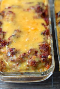 two casserole dishes filled with cheese and meat