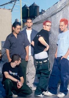 group of young men standing next to each other