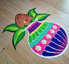 this is an image of a handmade decoration on the floor with flowers and leaves