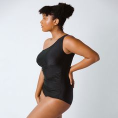 With a striking one-shoulder design, ample rows of shapely ruching, the Icon Swimsuit is our paragon of vintage-inspired glamour. The unique shape will have you drawing envious stares at the pool or seaside, and the Icon's easy fit and tug-free one-piece design prove that high-style can be effortless. This sexy modest suit stays in place whether you are splashing in the pool with your kiddos or paddle boarding at the lake. Large bust friendly (up to DD, then we recommend sizing up) Long torso fr Albion Fit Swim, Albion Fit Swimsuit, Albion Fit, Flattering Swimsuits, Maternity Swimsuit, One Shoulder Swimsuit, Short Torso, Beautiful Suit, Long Torso