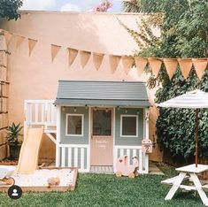 there is a small play house in the yard