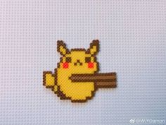 a close up of a piece of art made to look like a pikachu