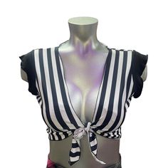 Black And White Striped Referee Stretchy Lycra Crop Top With Front Tie Brand New And Packaged One Size (Can Be Worn As A Women’s Xs, Small, Medium And Even A Large Depending On Your Measurements.) Sleeveless With Slight Ruched Ruffled Shoulder 2nd Photo Is A Modeled Photo, But This Listing Does Not Come With The Hat Or Whistle. Only Includes The Top. Great For Sporting Events, Roller Derby, Athlete Cosplay, Bar Employees, Nightlife, Dollskill Shirt Style, Festival Set, Rave Outfit, Sporty Hallow Trendy Black Tops For Beach Season, Trendy Black Top For Beach Season, Trendy Black Crop Top For Beach Season, Black Beachwear Crop Top For Spring, Black Crop Top For The Beach, White Beachwear Tops For Party, Black Spring Beachwear Crop Top, Black Crop Top For Spring Beachwear, Striped V-neck Top For Party