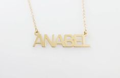 "Capital name necklace. Name necklace.Personalized gold necklace. Gold name necklace. Gold personalized necklace. Name jewelry. gift for her 🌟 Name necklace info: Capital letters name necklace. Gold plated 18k brass.or plan sterling silver 925. The measurements of the name plate changes according to the name you order. The name plate is 0.8 thick. Letters are 10 mm high. Lengths available - 16\", 18\", 20\", 22\". 🌟 Shipping Info: All necklaces are packaged and shipped in a beautiful gift box. Gold Nameplate Necklace For Everyday, Personalized Name Gold Necklaces, Gold Name Necklace With Initial Pendant For Mom, Personalized Gold Necklaces With Names, Minimalist Gold Name Necklace As Gift For Mom, Gold Minimalist Personalized Name Necklace, Dainty Customizable Gold Name Necklace, Personalized Gold Name Necklaces, Gold Necklace With Names For Mom