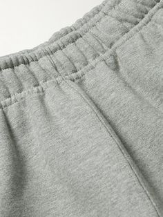 Nike's sweatpants are designed for everyday comfort and versatility. Updated with zipped pockets, they're cut for a neat taper from fleece-back cotton-blend jersey and have an elasticated drawstring waistband. Note the solo 'Swoosh' embroidered at the leg. Nike Collection, Sweatpants Nike, Sweatpants For Men, Nike Sweatpants, Nike Outfits, Drawstring Waistband, Mens Sweatpants, Mr Porter, Fashion News