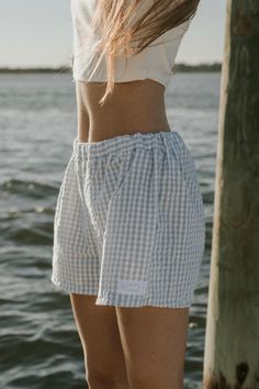 The Simply Daring Cotton Gingham Boxers are the perfect addition to your chill coastal girl wardrobe. Each one is handmade and designed in North Carolina. -Moderate length  -Can be worn high or low rise -Elastic waistband  -No tags -Simply Daring patch detail -True to size -Gentle Wash, Hang Dry Fall Loungewear, Coastal Girl, Grandpa Style, Chill Fits, Summer Photoshoot, Sleep And Loungewear, Wilmington Nc, Girls Wardrobe, Lounge Shorts