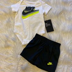 Black Elastic Waistband Shorts White Onsie With Plastic Snaps Ynf 11668, 11558, 11560, 11345, 11344 Black Nike Tracksuit, Nike Sweat Suit, Nike Jogging Suits, Nike Sweatshirts Hoodie, Baby Boy Camo, Nike Set, Baby Gadgets, Black And White Pants, Nike Tracksuit