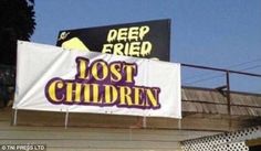 a sign that says lost children hanging from the side of a building