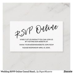 a white business card with the words rsp online on it in black ink, against a marble background