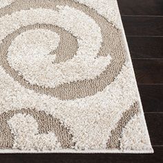 Distinctive patterns and luxurious textures come together in Safavieh’s Shag Rug Collection. Modern motifs and native geometric designs are set in a lush, comfort-soft pile creating a chic look beautifully styled for today's home décor. These shags are made using soft, durable synthetic yarns for incredible comfort and high performance year after year.Pile Height: 6 Beige Design, Rug Texture, Rugs Size, Ivory Rug, Beige Rug, Rug Collection, Color Ivory, Power Loom, Geometric Designs