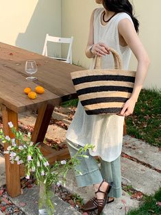 IN STOCK NOW SHIPPING FROM LOS ANGELES Add some summer vibes to your wardrobe with Elena Handbags' Raffia Basket Bag. Perfect for a day at the beach or a summer picnic, this bag features a stylish striped design and is made from durable and lightweight raffia material. Stay on trend and stand out with this must-have summer fashion accessory! Natural Soft Raffia Straw Handmade Size: 9"H x 14"W x 7"D Designer Style ID: 8652 Bohemian Bucket Bag For Summer Travel, Bohemian Style Bucket Bag For Summer Travel, Bohemian Summer Travel Bucket Bag, Bohemian Style Summer Travel Bucket Bag, Bohemian Beach Bags In Bucket Shape, Bohemian Tote Bucket Bag For Summer, Bohemian Summer Tote Bucket Bag, Bohemian Bucket-shaped Beach Bags, Spring Bohemian Large Capacity Beach Bag