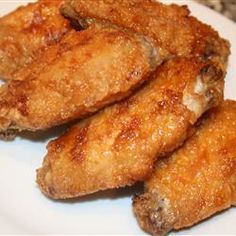 some fried food is on a white plate