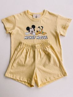 short sleeve mickey set Playful Mickey Mouse Cotton Sets, Mickey Mouse Cotton Loungewear Sets, Cute Yellow Short Sleeve Clothing Sets, Cute Yellow Short Sleeve Sets, Cute Yellow Sets With Short Sleeves, Cute Yellow Set With Short Sleeves, Summer Cotton Mickey Mouse T-shirt, Mickey Mouse Cotton T-shirt For Summer, Summer Mickey Mouse Cotton T-shirt