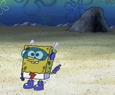 spongebob is standing in the sand with his hand up and pointing at something