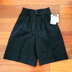 Nwt Vintage Jones New York Black High-Waisted Knee-Length Shorts With Hem Fold. Size 2p. Button And Zip Front Closure. Two Deep Side Pockets (Now Hard To Find). Single Right Back Pocket With Button Closure. Never Been Worn. Includes Extra Button For Mending, If Needed. Make Me An Offer Or Ask Me More Questions Below! High Waist Bermuda Shorts With Pockets, High-waisted Solid Bermuda Shorts For Workwear, Solid High-waisted Bermuda Shorts For Work, Solid Color High-waisted Bermuda Shorts For Work, High Waist Workwear Shorts For Spring, High-waisted Workwear Shorts For Spring, High Waist Shorts For Spring Workwear, Classic High Waist Shorts For Work, High Waist Bermuda Shorts For Work