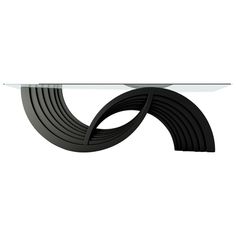 a glass and metal table with curves on it