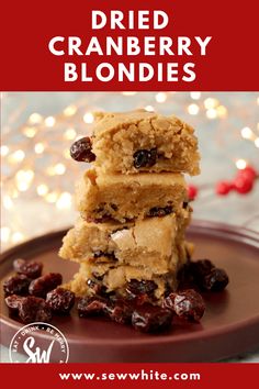 three pieces of cranberry blondies stacked on top of each other with the words,