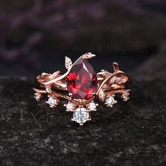 Item description ✦ Handmade, high-quality item! ✦ Material: 925 sterling silver, Solid 10k/14K/18K GOLD (can be made in white/rose/yellow gold) Engagement ring ✦ Center Stone: Lab Ruby ✦ Size/Weight: 6x8mm Pear Cut Wedding band ✦ Gemstones: Round Cut Moissanites Any ring size can be made,if the ring size is not in the option list ,contact me. As it is handmade,it needs 2-4 weeks to finish and then be shipped by usps or DHL. Return policy: We offer 30 days return policy. For any reason, if you are not completely satisfied with your order, you may return it for a refund.  Buyer is responsible for the handcraft fee (15%-30% of the total price) and the return shipping cost. Ruby Wedding Rings For Women, Rose Gold Ruby And Diamond Ring, Ruby Gold Wedding Ring, Unique Engagement Rings Red, Ruby Red Wedding Ring, Burgundy Engagement Ring, Red Diamond Wedding Ring, Ruby Engagement Ring Gold Vintage, Persephone Engagement Ring