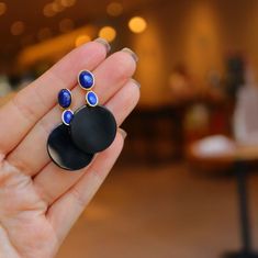 "This is a black onyx dangle earrings with round shaped black onyx and natural blue lapis lazuli in geometric design. It's modern and boho style.  Material: 925 Sterling Silver Gold Plated Gemstone: Natural Black Onyx & Lapis Lazuli Don't forget to find more designs from our shop: https://www.etsy.com/hk-en/shop/NikiFashionJewelry Be sure to hit \"favorite\" on the right so it remains in your favorites list and/ or add to your wish list(s). Hope you enjoy my designs. ❤PIN IT on PINTEREST ❤FOLLOW Modern Black Jewelry With Matching Earrings, Trendy Black Earrings For Gift, Trendy Black Formal Jewelry, Black Pierced Dangle Jewelry, Black Drop Earrings Jewelry Gift, Formal Black Single Earring, Black Jewelry With Matching Earrings For Jewelry Making, Black Metal Dangle Earrings, Black Dangle Pierced Jewelry