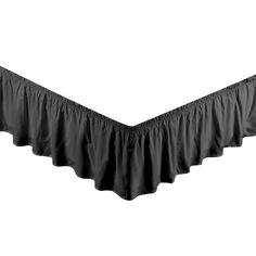 a black ruffled bed skirt on a white background