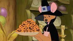 a cartoon character holding a plate with cookies in it's hand and wearing a witch hat