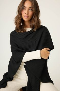 Wrap yourself in comfort and style with this women's black luxe ribbed lounge wrap. Made from ultra-soft ribbed fabric, this piece is perfect for layering over your favorite loungewear or pairing with jeans for a casual day out. Its sleek design and open front offer versatility, while the ribbed texture adds a touch of elegance to your cozy wardrobe. Perfect for lounging or jet-setting in comfort. Cozy Wardrobe, Lounge Cardigan, Ribbed Texture, Sleepwear & Loungewear, Ribbed Fabric, Jet Set, Front Open, Sleek Design, Layering