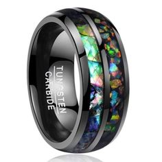 an unique black ceramic ring with colorful abamolite inlays and beveled edges