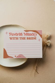 a plate with a note that says advice for the bride on it next to some dried flowers