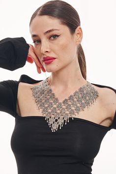 Drape yourself in elegance with our Bohemian silver statement necklace. The intricate geometric patterns and cascading design make this piece a true showstopper. Perfect for special occasions or to elevate an everyday outfit, this necklace promises to draw admiring glances. Crafted with care, it's a reflection of both beauty and artistry. A thoughtful gift for birthdays, anniversaries, or any day you want to make special. Bohemian Bib Necklace For Wedding, Silver Bohemian Choker For Party, Elegant Metal Bib Necklace For Festivals, Silver Bohemian Bib Necklace Choker, Silver Metal Bib Necklace For Wedding, Elegant Festival Necklace With Intricate Design, Boho Chic Accessories, Silver Statement Necklace, Silver Necklace Statement